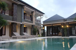 Отель Jonsen Homestay  North Kuta
